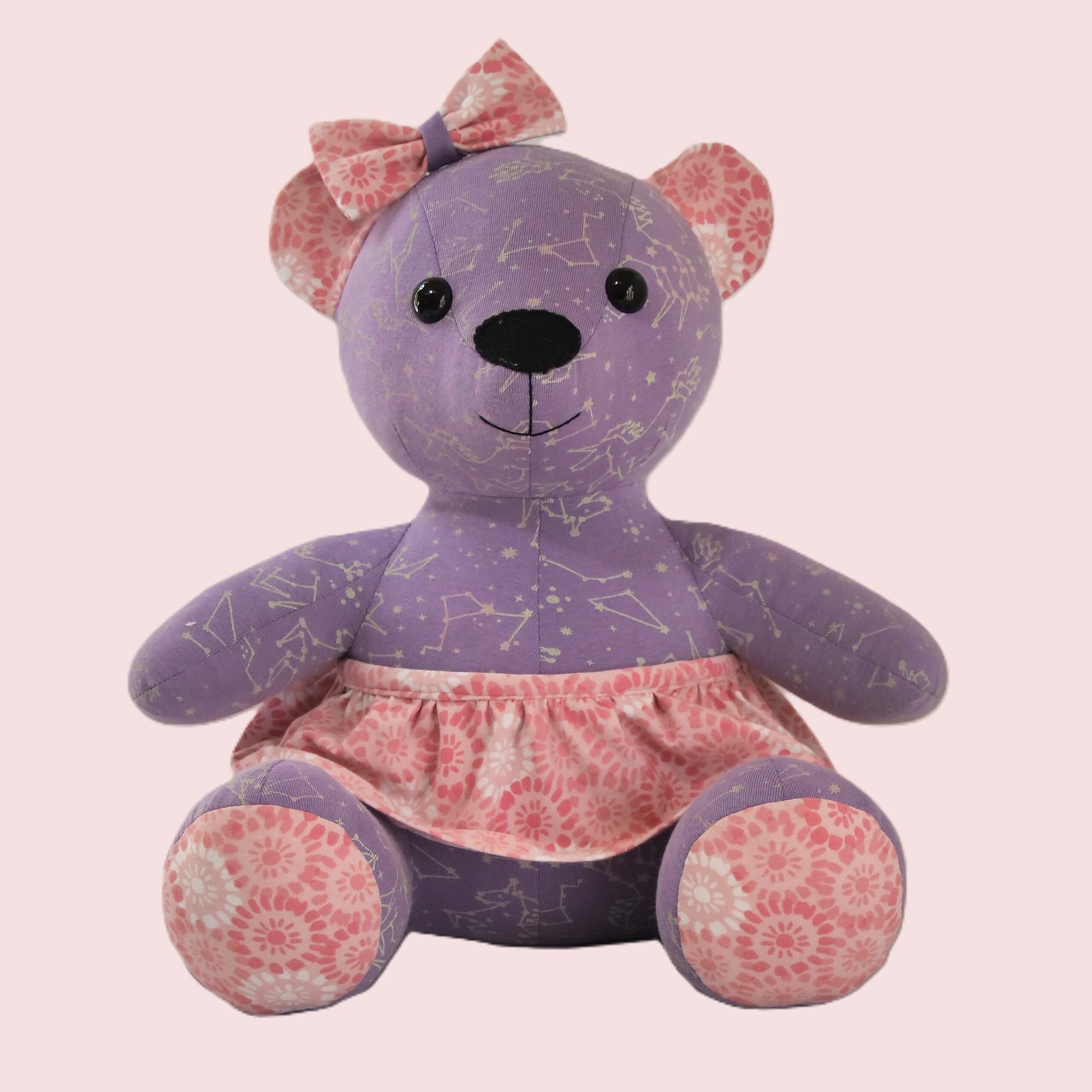 Handmade memory bear sewn from baby clothes — front view